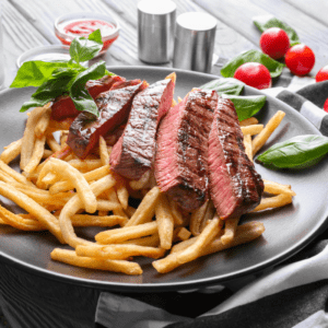 Cote de porc, sauce BBQ, frites maison